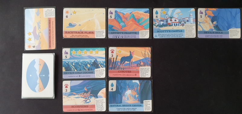 Middle way through a match against the solo bot, with the bot's card above followed by the player's journey and scrapbook rows below